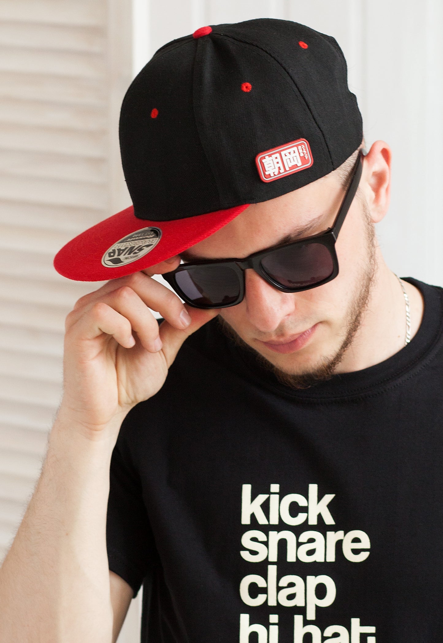 Snapback Baseball Cap with Japanese Applique – Black with Contrast Red Peak