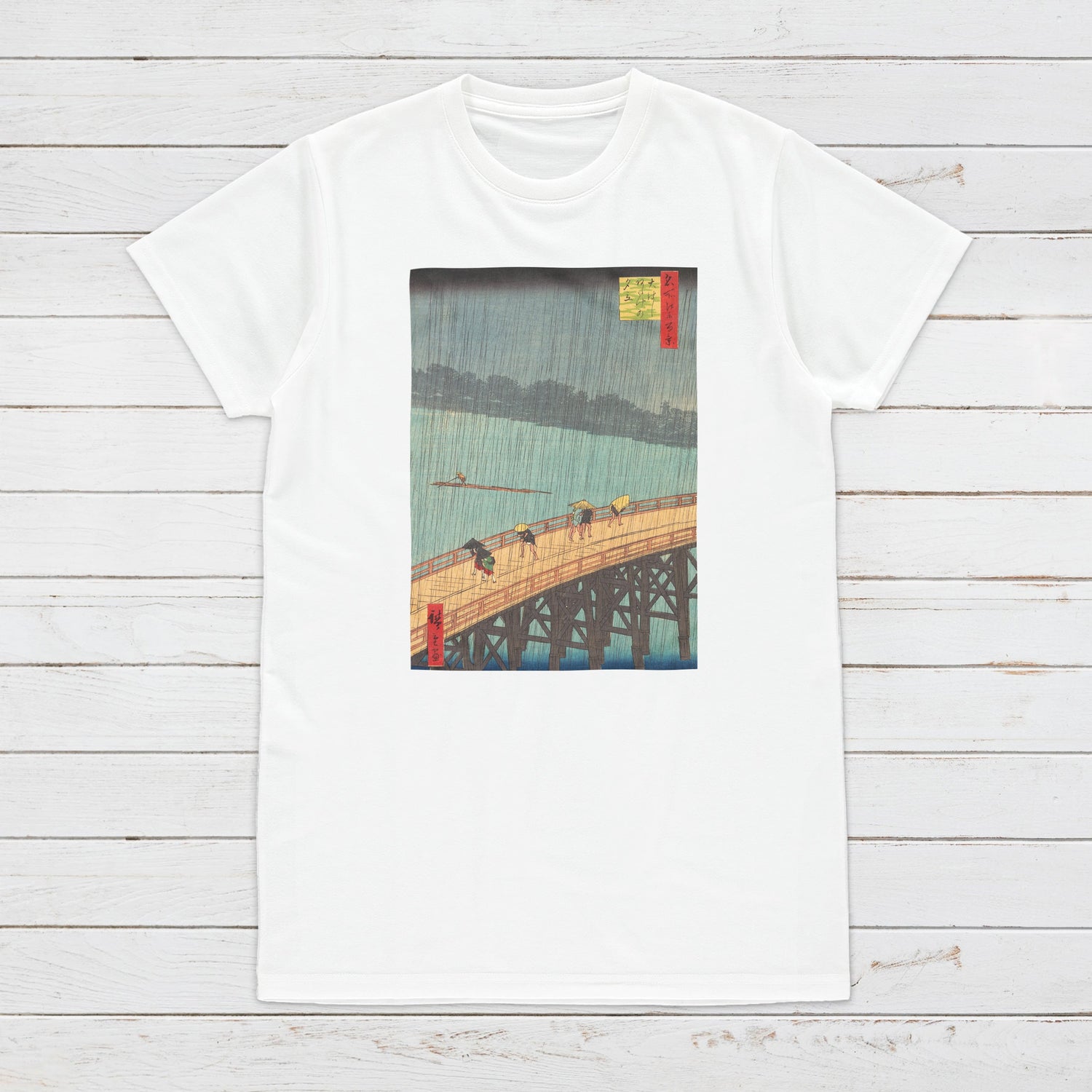 A top view of a T Shirt with an Utagawa Hiroshige's art print "Sudden Shower over Shin-Ōhashi Bridge and Atake "