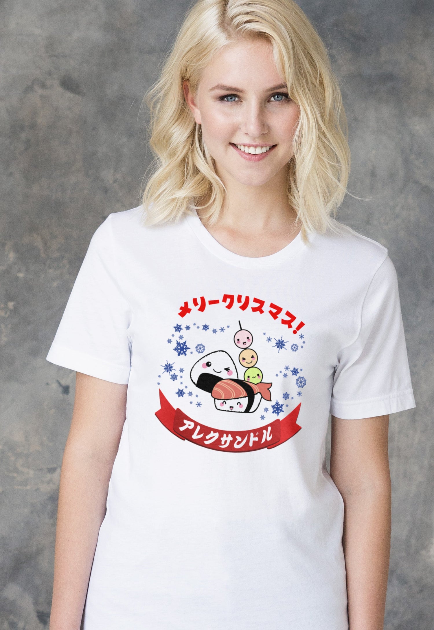 A young woman wearing a white personalised T Shirt with her name written over a kawaii sushi design