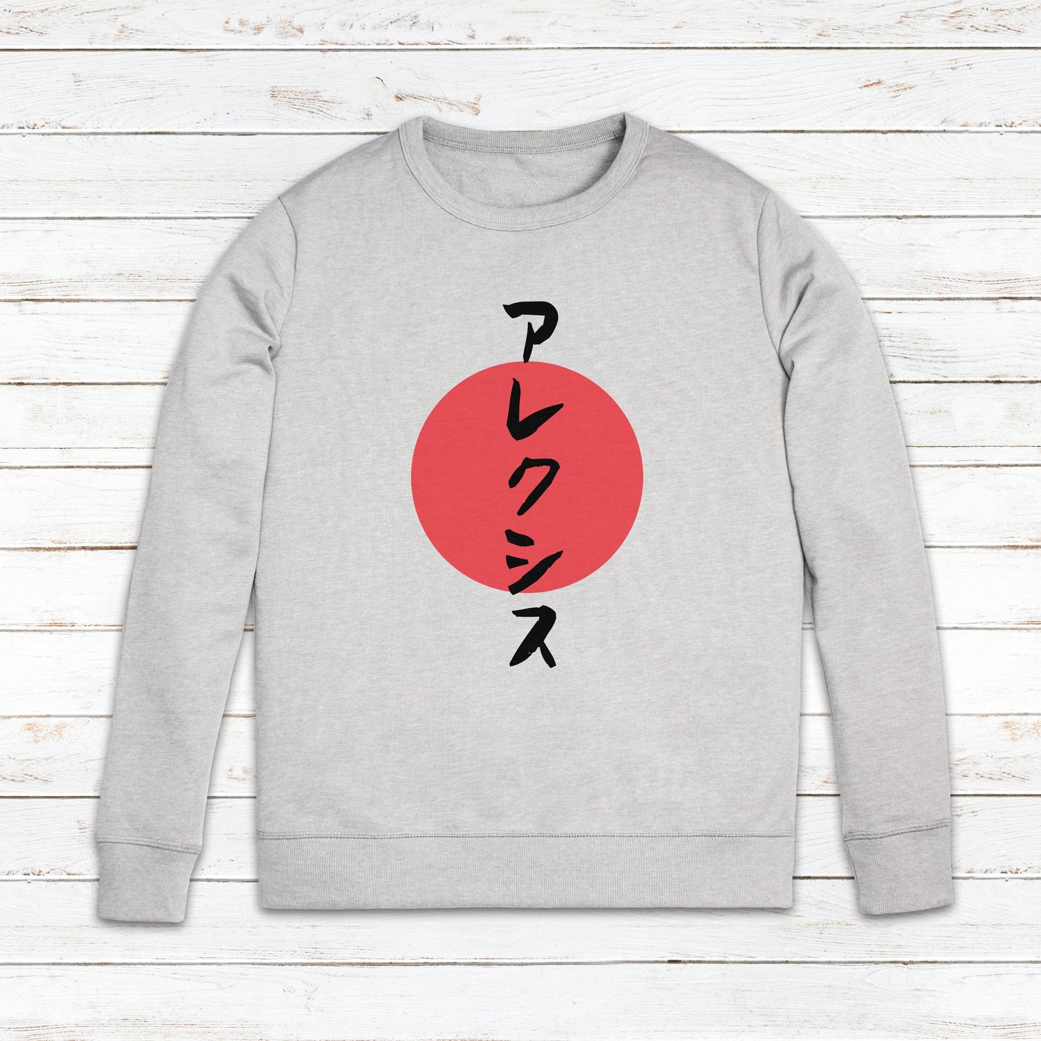 Top view of a greay Sweatshirt with a personalised print of a name in Japanese on it
