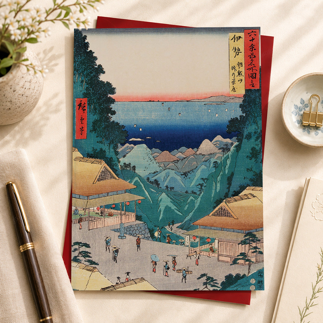 Japanese art Greeting card featuring "Teahouses at the Top of Mt Asama, Ise" (伊勢 朝熊山峠の茶屋), 1853
by Utagawa Hiroshige (1797–1858).