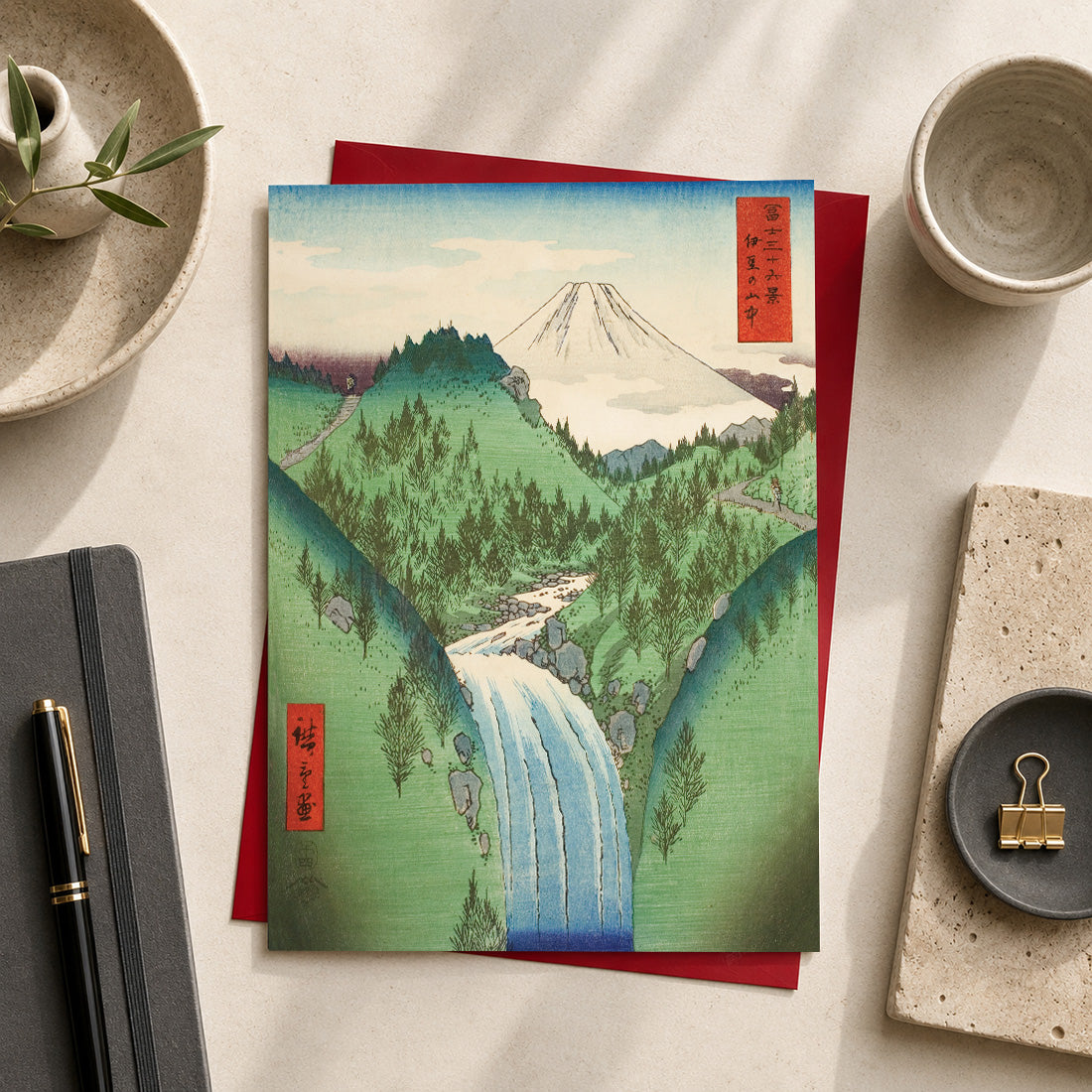 Japanese art greeting card featuring “In the Mountains of Izu Province” (伊豆の山中 / Izu no Sanchū), 1858
by Utagawa Hiroshige (1797–1858), from the series Thirty-six Views of Mount Fuji.