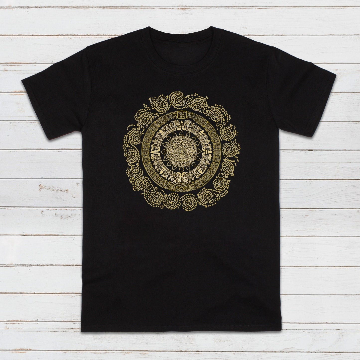 A black unisex T Shirt printed with a large design of a gold-coloured MayanIncan Aztec round calendar