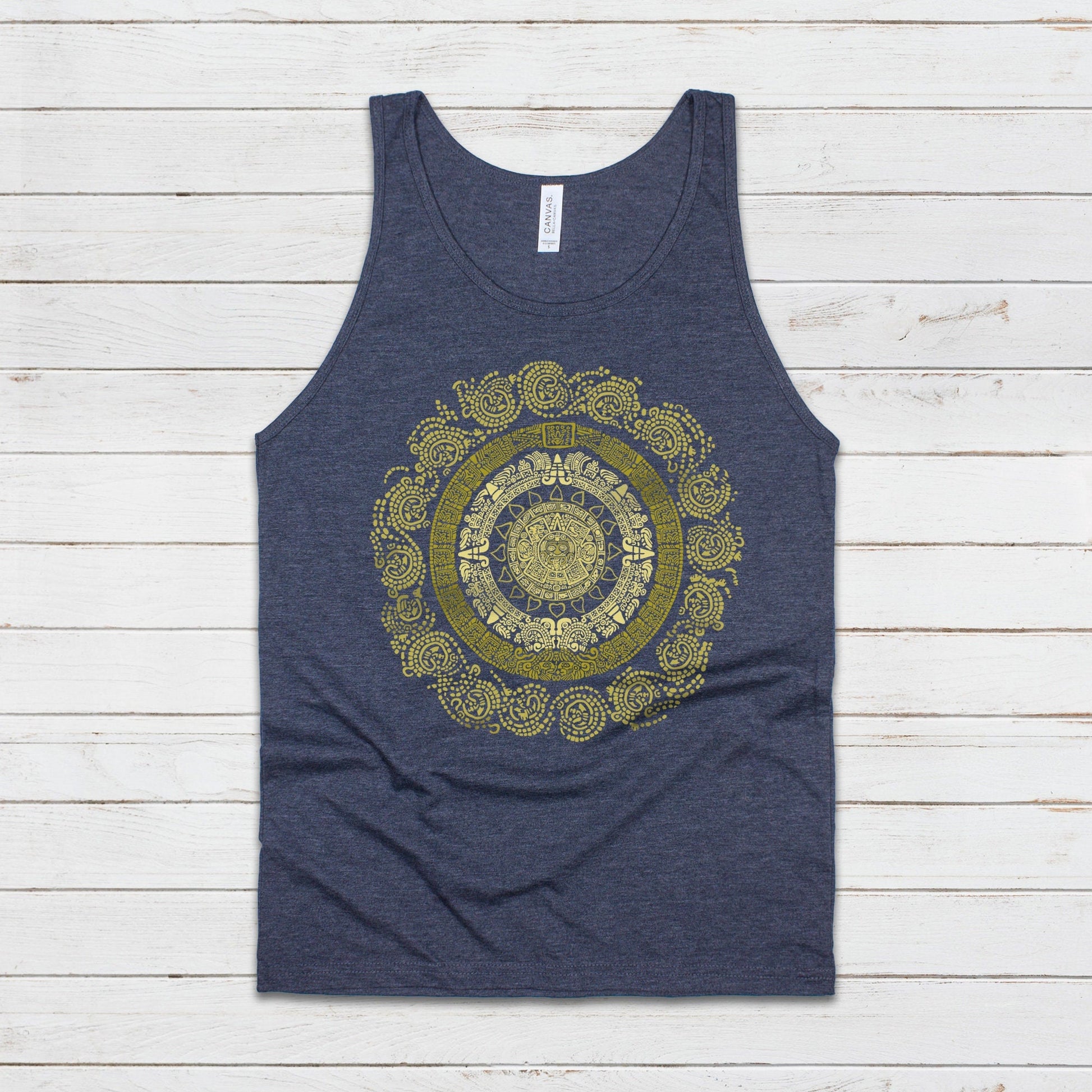 A navy blue vest tank top with a golden colour print of a Mayan Incan Aztec round calendar